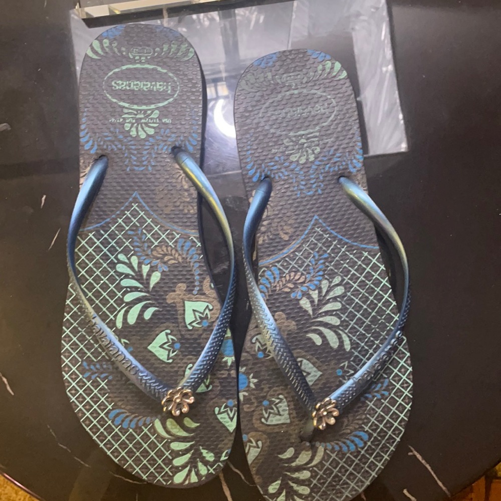 Havaianas. Dark blue with printed bottom.